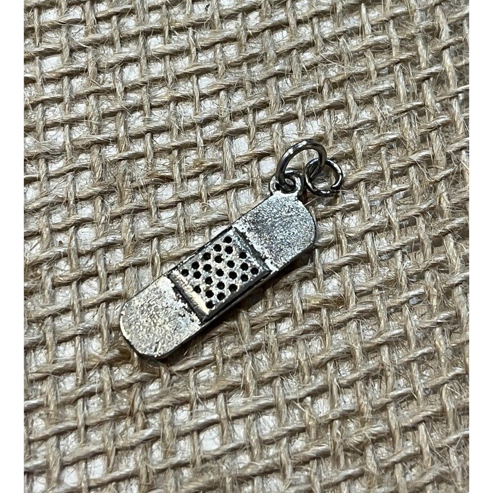 Vintage Silver Tone Bandage Medical Charm Pendant 5/8" Signed